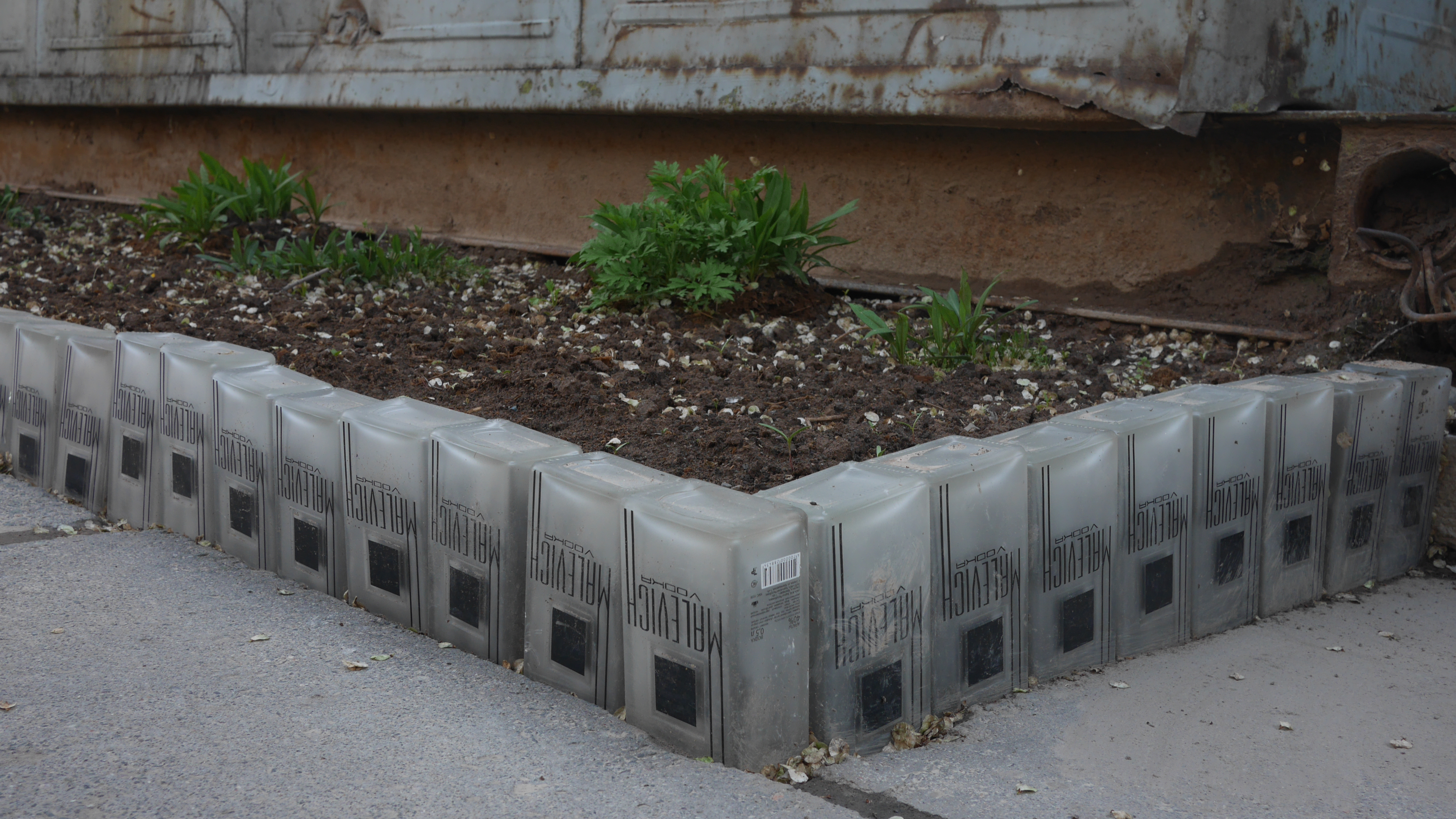 A row of emptied Malevich vodka bottles used to occupy a chunk of public space in Bishkek, Kyrgyzstan; photo: Oleksiy Radynski